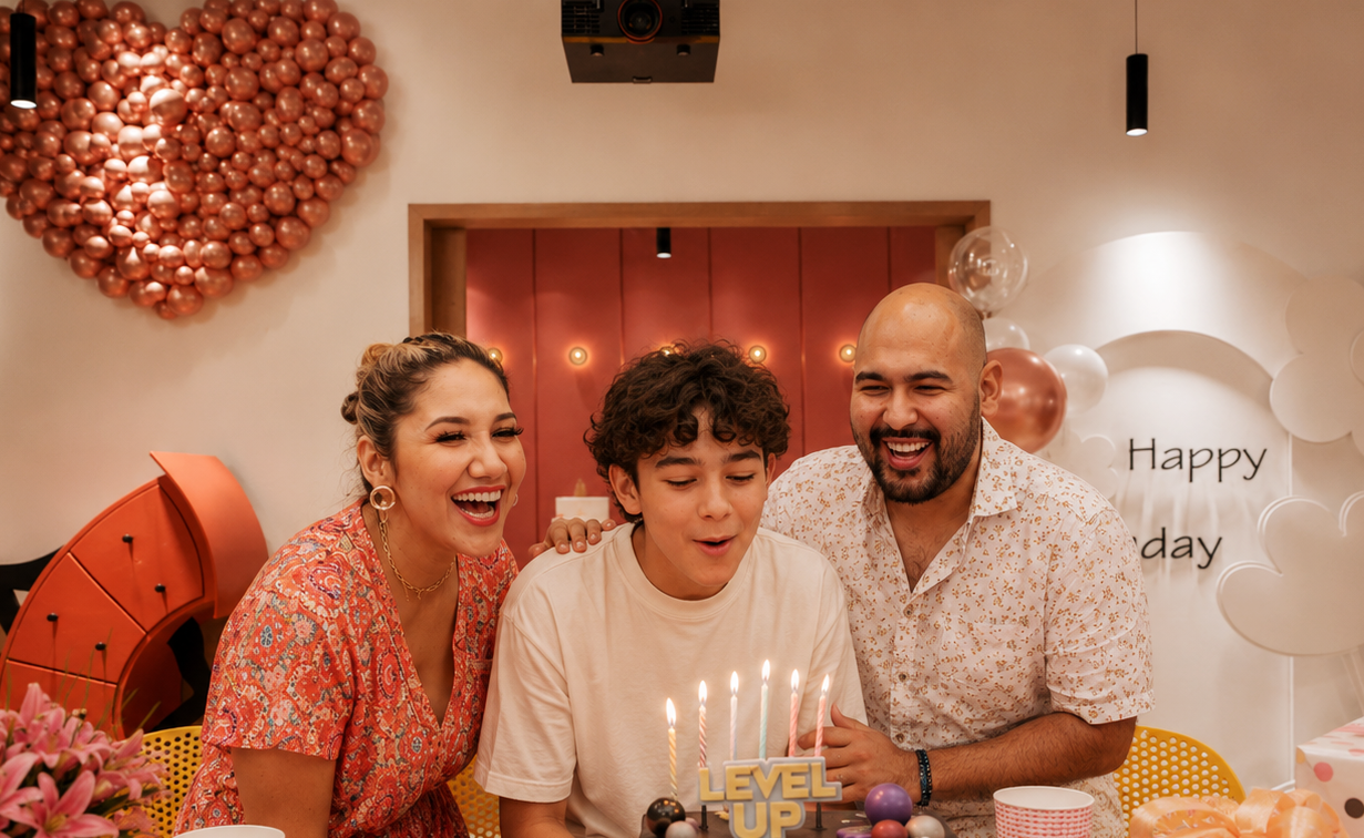 Power Play Sydney birthday party room with family celebrating around a cake