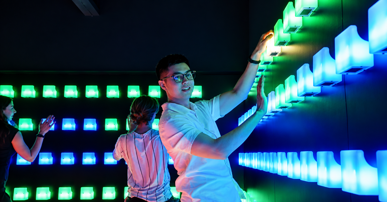 Indoor date ideas at Power Play Sydney: a neon interactive game setting